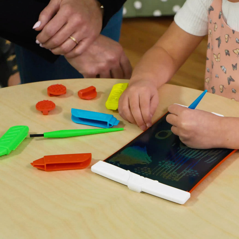 kid and parent using scribble n' play creativity kit
